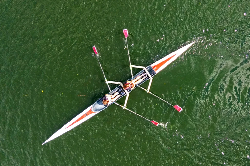 Two rowers in a double scull seen from above